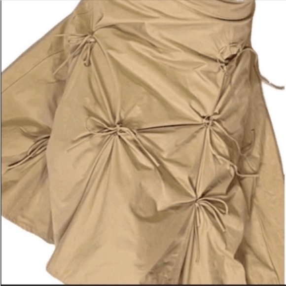 Tan midi skirt with front lace up bows and side belt detail. Size small. - Picture 2 of 3